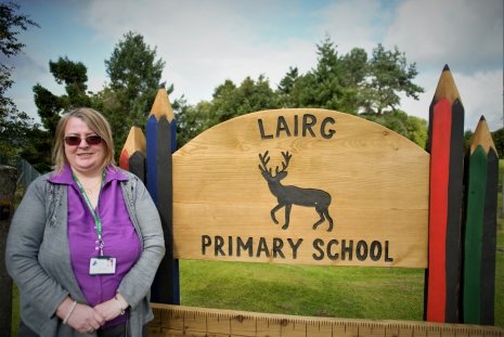 Lairg Primary School sign and Head Teacher Ruth Adams