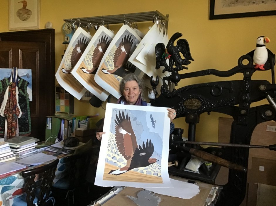 Artist, Lisa Hooper displaying her new eagle artwork for the project leaflet