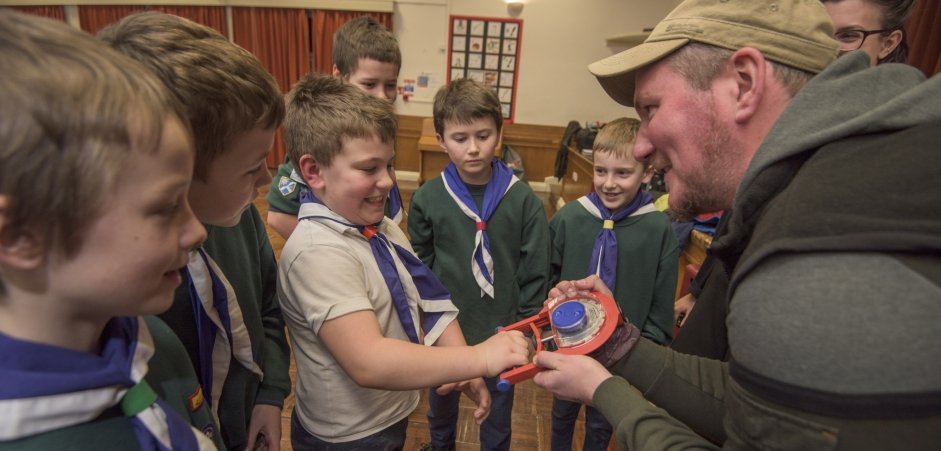 Cub-scouts test their strength using a dynometer and compare it to that of a golden eagle