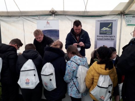 Children taking part in an eagle themed activity at the Scottish Borders Schools Countryside Day